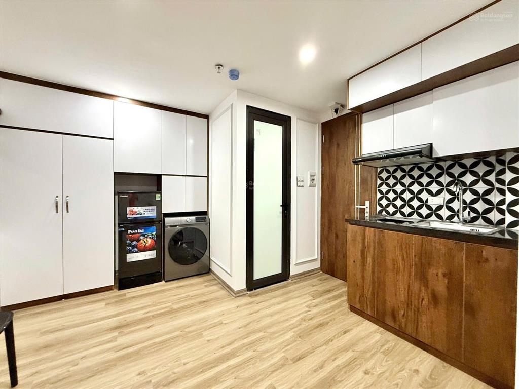 Bán toà ccmn 110m2 x7 tầng phố hoàng văn thái ô tô tránh ngõ thông doanh thu 150tr/tháng