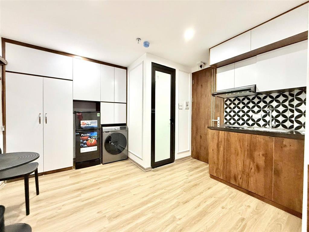 Bán toà ccmn 110m2 x7 tầng phố hoàng văn thái ô tô tránh ngõ thông doanh thu 150tr/tháng