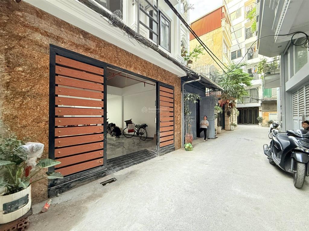 Bán toà ccmn 110m2 x7 tầng phố hoàng văn thái ô tô tránh ngõ thông doanh thu 150tr/tháng