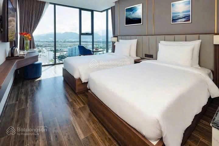 Bán khách sạn amber hotel đường biệt thự, tân lập nha trang, 18 tầng 44 phòng, dòng tiền 750tr/th