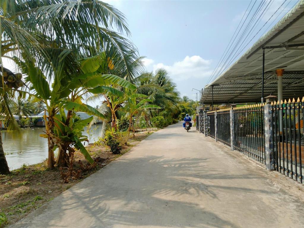 Bán đất tặng nhà trệt kiên cố lộ ô tô view sông, sau giáp kênh thủy lợi 10m cách đường tỉnh 922 1km