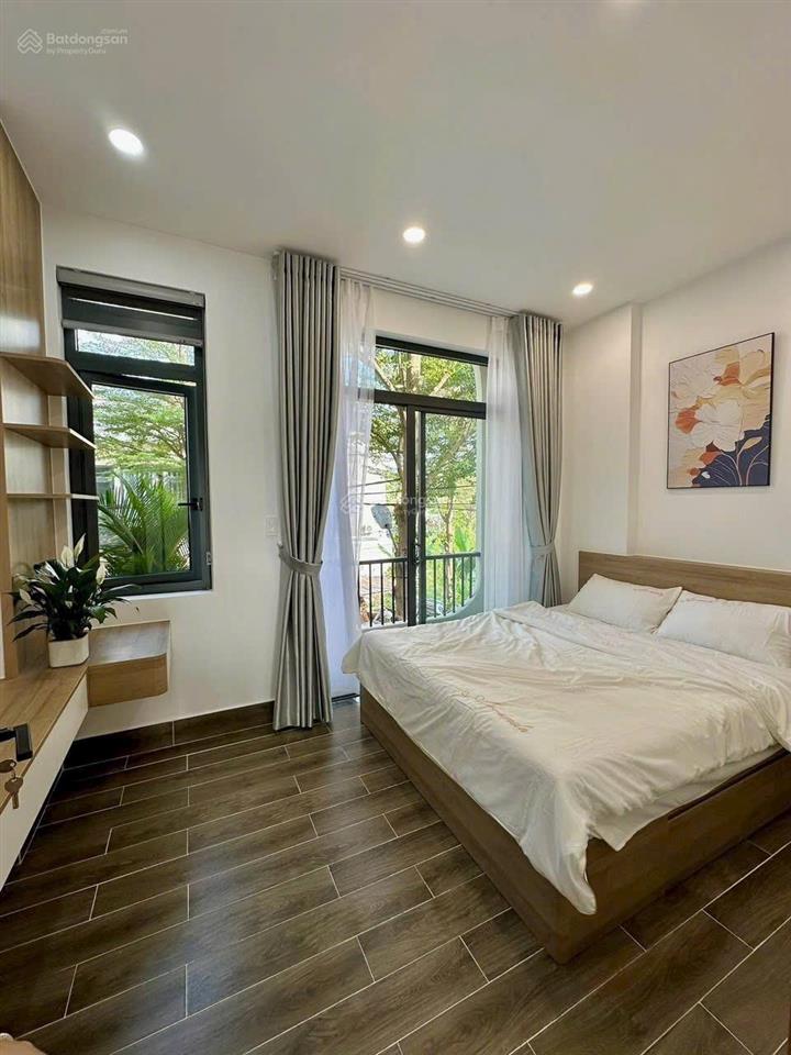 Bán nhà mới đẹp 1 trệt 2 lầu sát bên khu đô thị đông tăng long