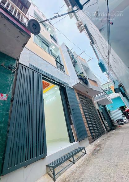 3,88 tỷ nhà xây mới 2 lầu st đúc btct sổ hồng mới hoàn công đầy đủ