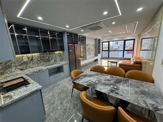 NHÀ 2 THOÁNG PHỐ ĐỖ QUANG- 52M- 7 TẦNG THANG MÁY- Ở SƯỚNG- GARA Ô TÔ- SÁT PHỐ. 