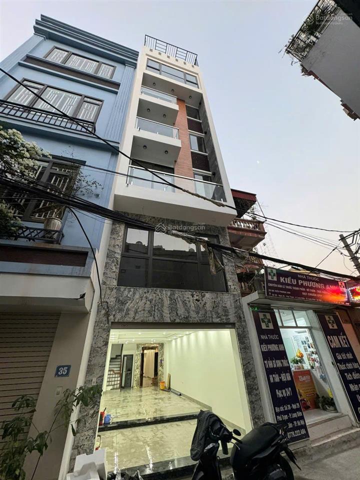 Nhà mới 56m2 tại phố trạm long biên hà nội  xây 7 tầng thang máy. ga ra ô tô