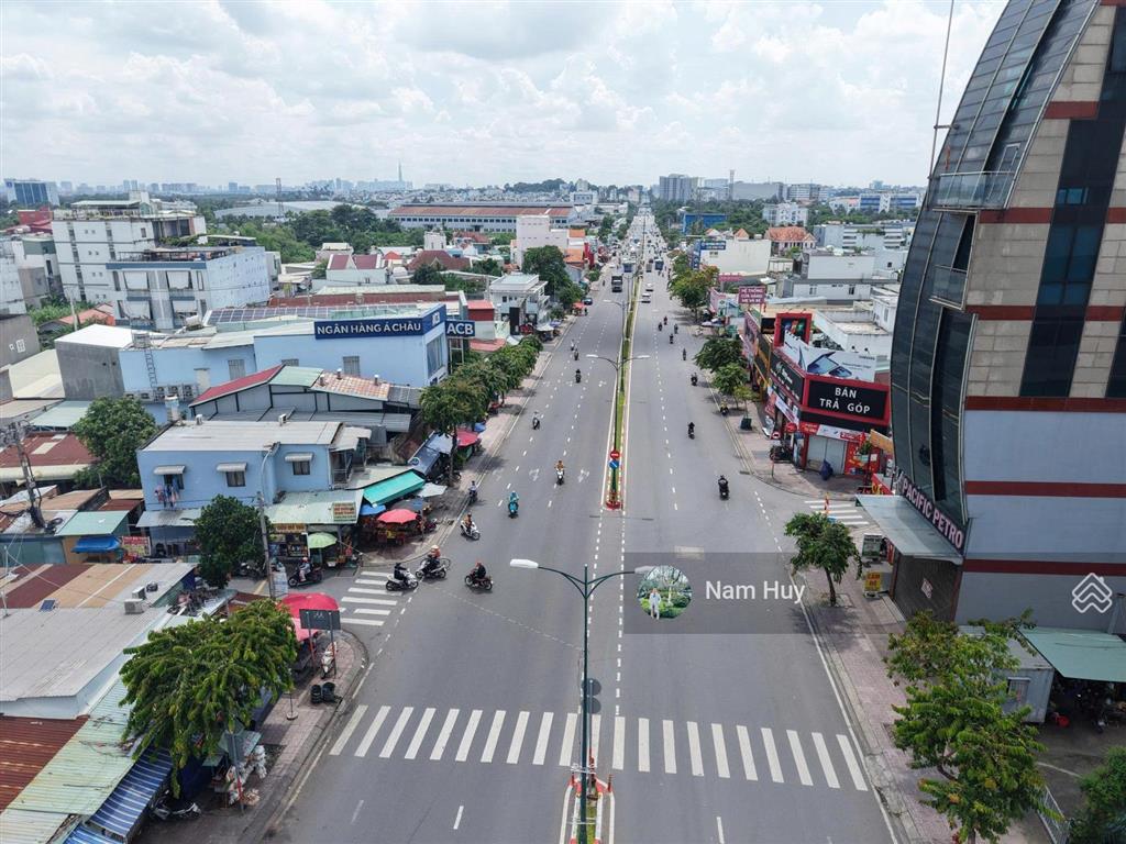 Giảm 3 tỷ bán gấp! mặt tiền lê văn việt  q.9 dt 5x23 = 115m2, đang cho thuê 35tr/th, giá 20,5 tỷ