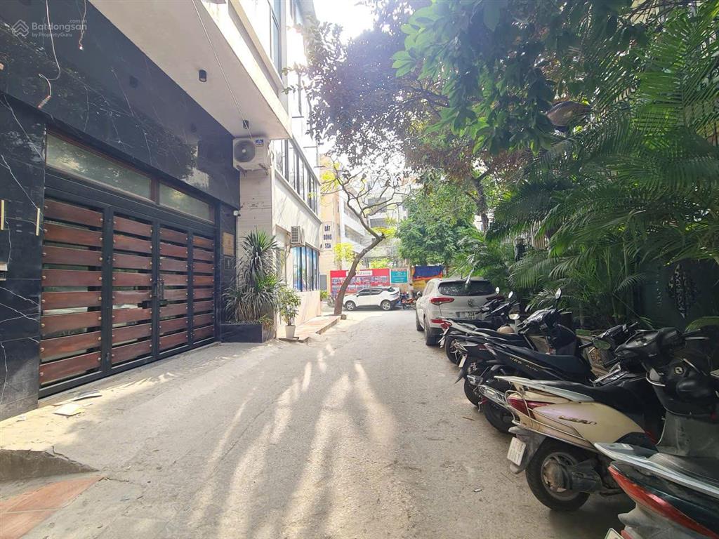 Bán tòa nhà văn phòng đường mễ trì 7 tầng t. máy, mt 5,7m, ô tô tránh đỗ ngày đêm, kd sầm uất