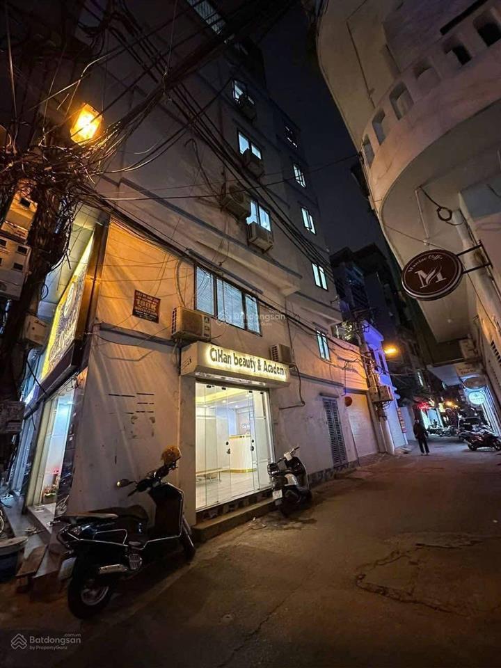 Mặt tiền 5m  lô góc mặt phố nguyễn văn tuyết  45m2 6 tầng  phố đi bộ kinh doanh tốt.
