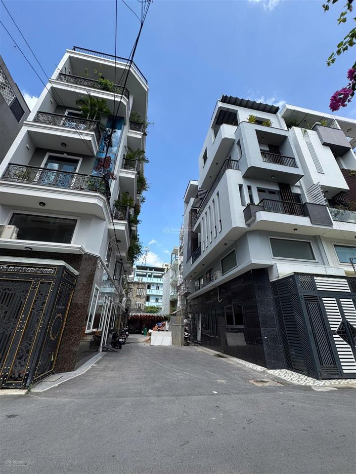 9,8 tỷ nhà hẻm dương quảng hàm 1 trệt  3 lầu