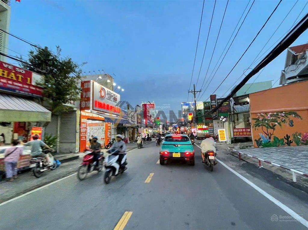 Bán gấp nhà 1 trệt 1 lửng  góc 2 mặt tiền  hẻm xe hơi  đường đỗ xuân hợp  ngang 8,94m 5,5 tỉ