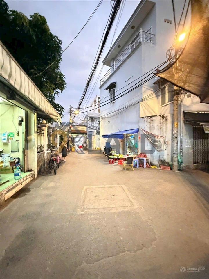 Bán gấp nhà 1 trệt 1 lửng  góc 2 mặt tiền  hẻm xe hơi  đường đỗ xuân hợp  ngang 8,94m 5,5 tỉ