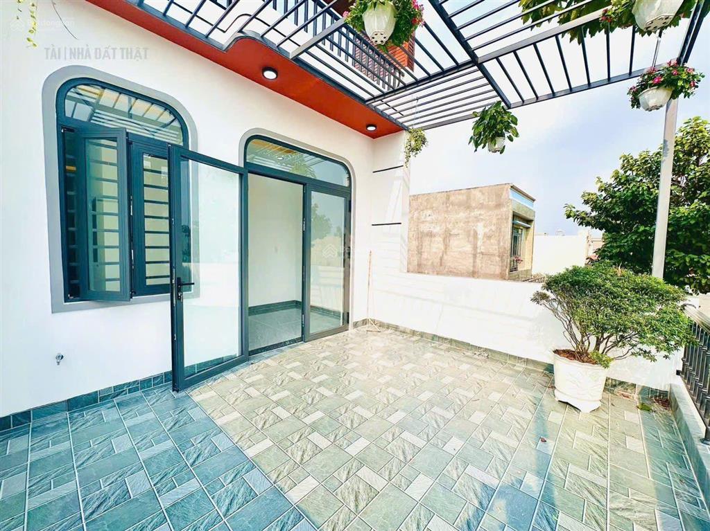 Bán nhà mới hoàn thiện hội nghĩa, thành phố tân uyên, bình dương 100m2 sân xe hơi 3 phòng ngủ