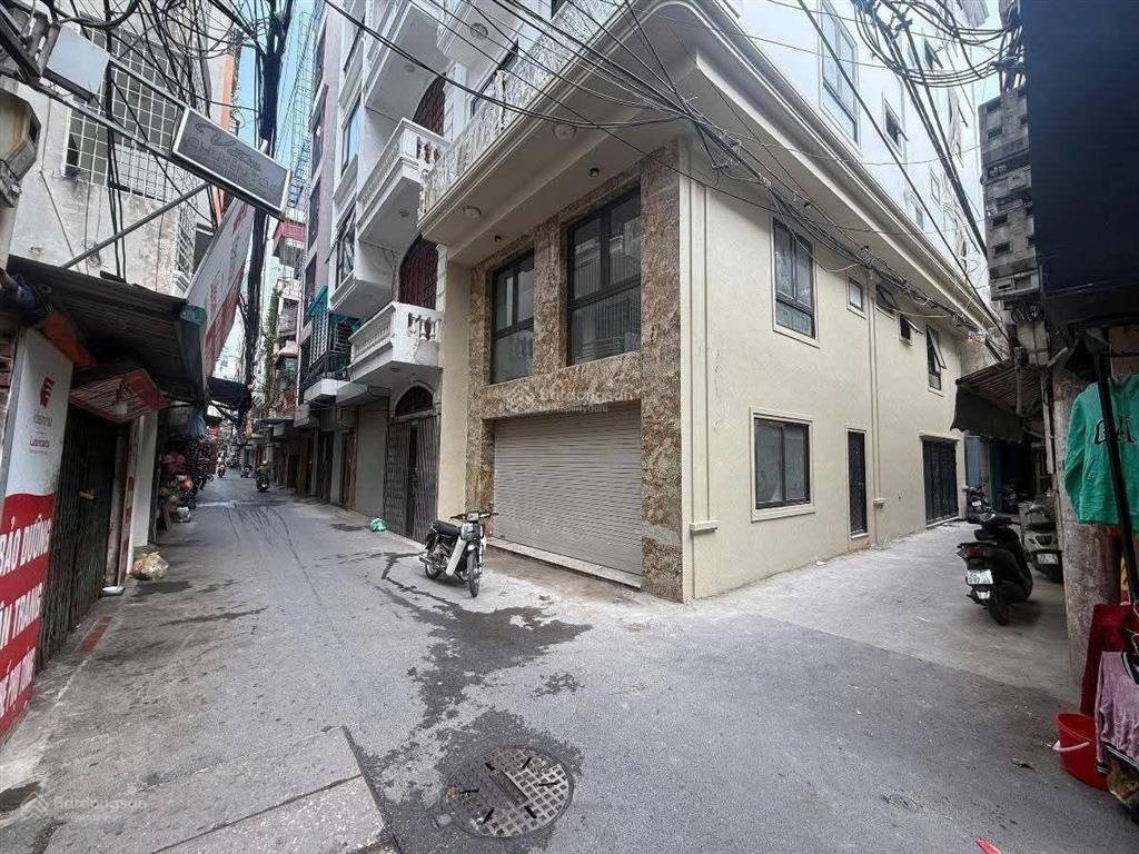 Tòa nhà mặt phố mới tinh phố thái thịnh, đống đa. dt 90m², 8 tầng, thang máy, 25 phòng, lô góc.