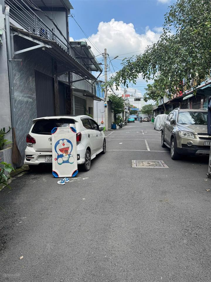 Nhà 1/ ngay chợ hl80b  nh 4,6x14m đúc 1 lửng 2 lầu hxh 9m