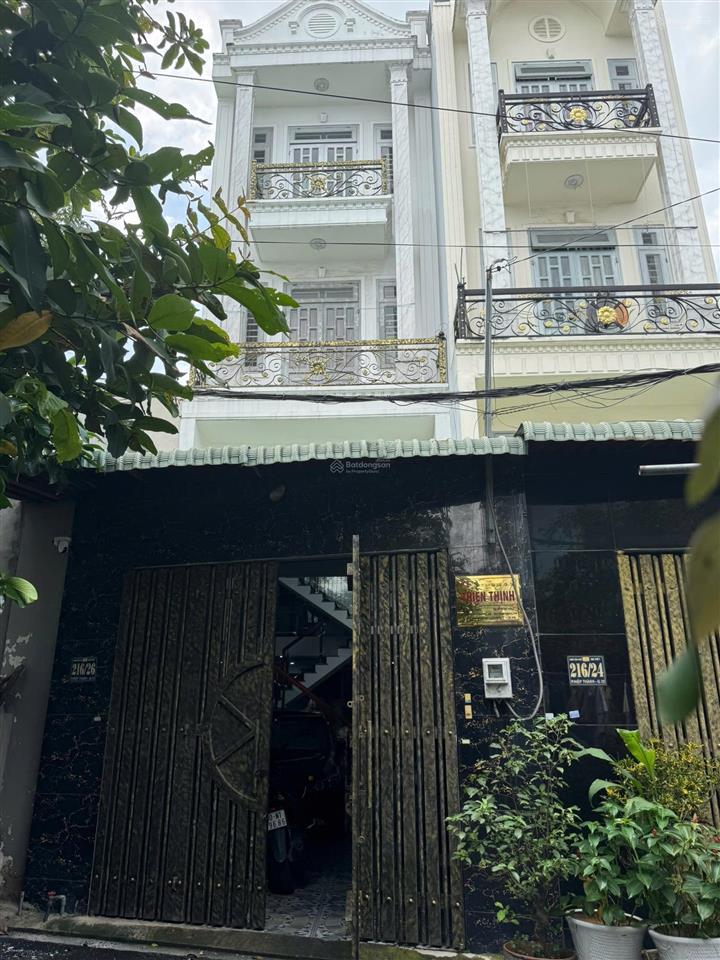 Nhà 1/ ngay chợ hl80b  nh 4,6x14m đúc 1 lửng 2 lầu hxh 9m