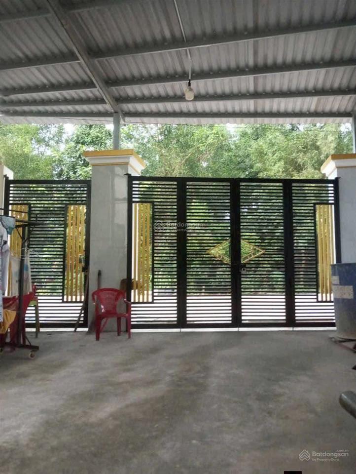 Bán nhà phường phú an bến cát cũ mặt tiền đường nhựa 12m kinh doanh. dt 122m trệt lầu .sổ sẵn