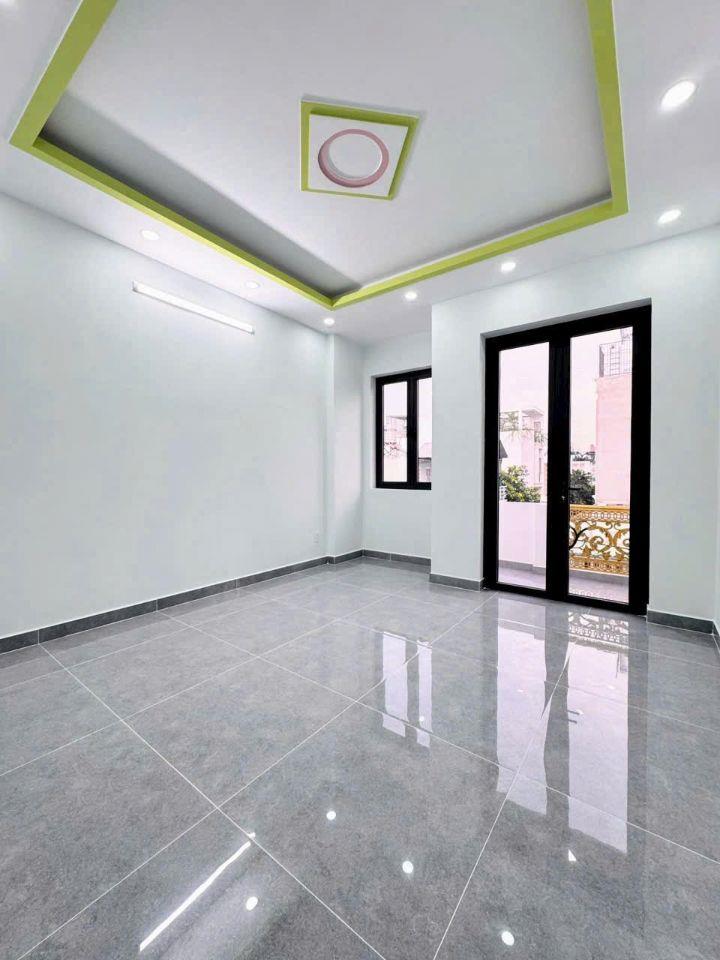 Nhà mới, đẹp 3 tầng hẻm xe hơi thông Gò Xoài 4PN, gần chợ khu sầm uất, đủ tiện ích 5.X tỷ.  