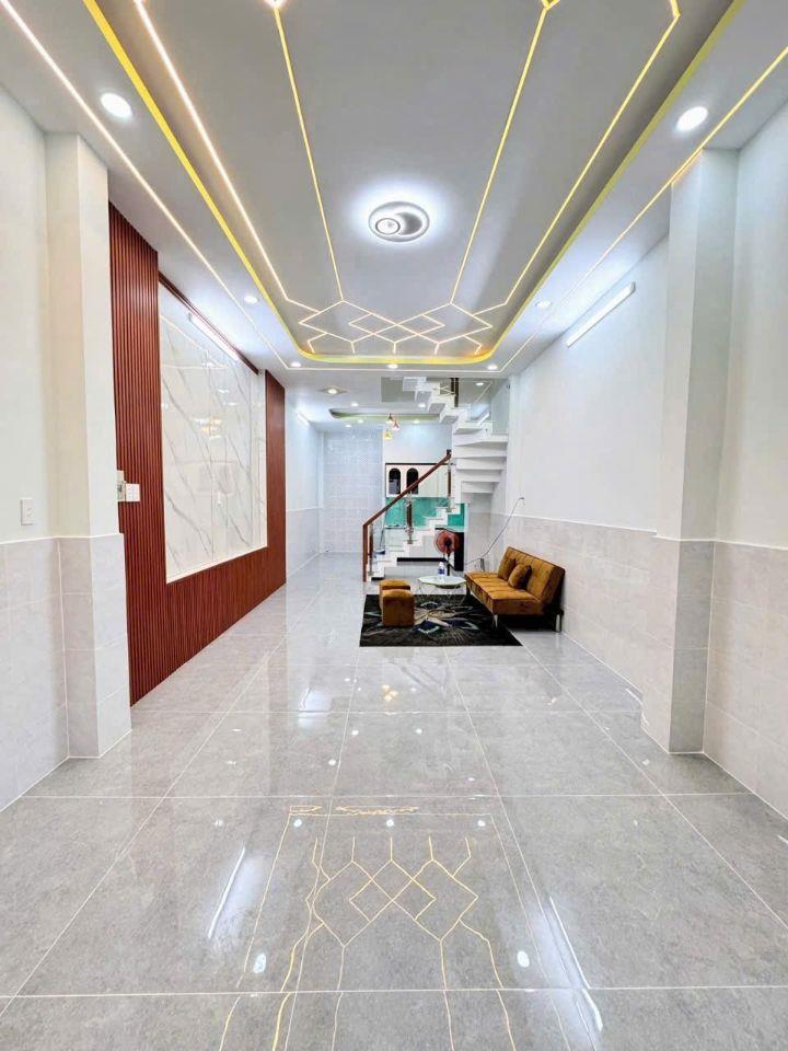 Nhà mới, đẹp 3 tầng hẻm xe hơi thông Gò Xoài 4PN, gần chợ khu sầm uất, đủ tiện ích 5.X tỷ.  