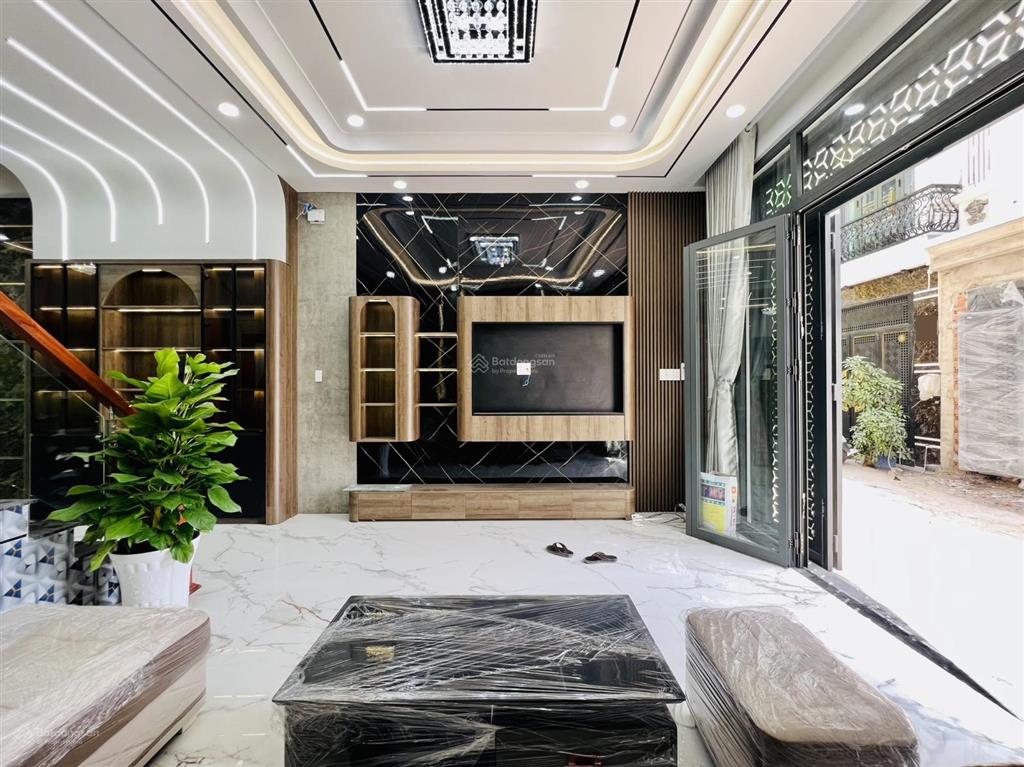 Giá tốt dãy nhà đẹp mới xây 4 tầng 67m2, chỉ 6,8 tỷ đường lê văn quới, shr, gần bốn xã