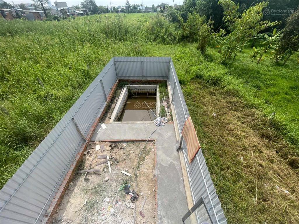 Nhà sổ riêng hoàn công gần cầu rạch tra, dt 175m2 ( 5m x 36m)  sân xe hơi , 3p/ ngủ