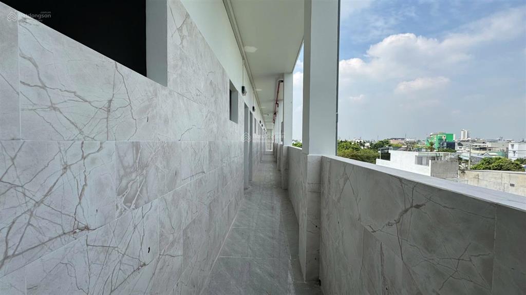 Giá giảm 2 tỷ bán tòa căn hộ vườn lài, an phú đông. dt 5,5 nở hậu 6m dài 24 (131,4m2 thổ cư)