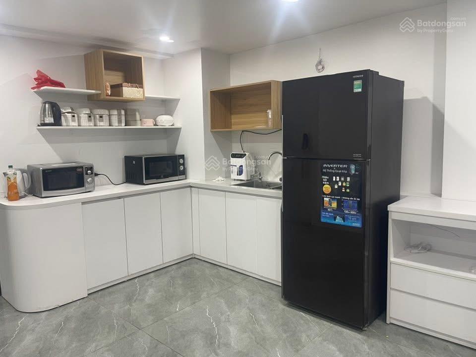 Dòng tiền 2 tỷ/năm  building trần thái tông  125m² mt8m  giá94 tỷ thang máy ô tô tránh.