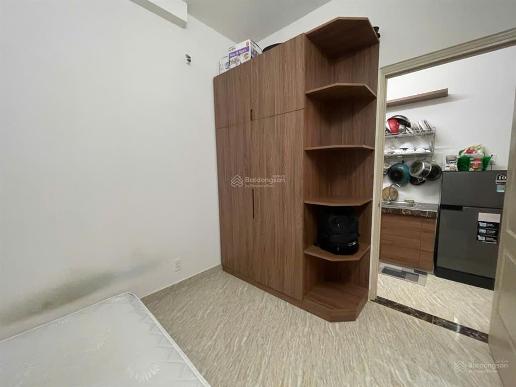 Cần tiền bán căn chung cư hoàng quân có sẵn nội thất, view xéo biển và phố. sổ đỏ lâu dài