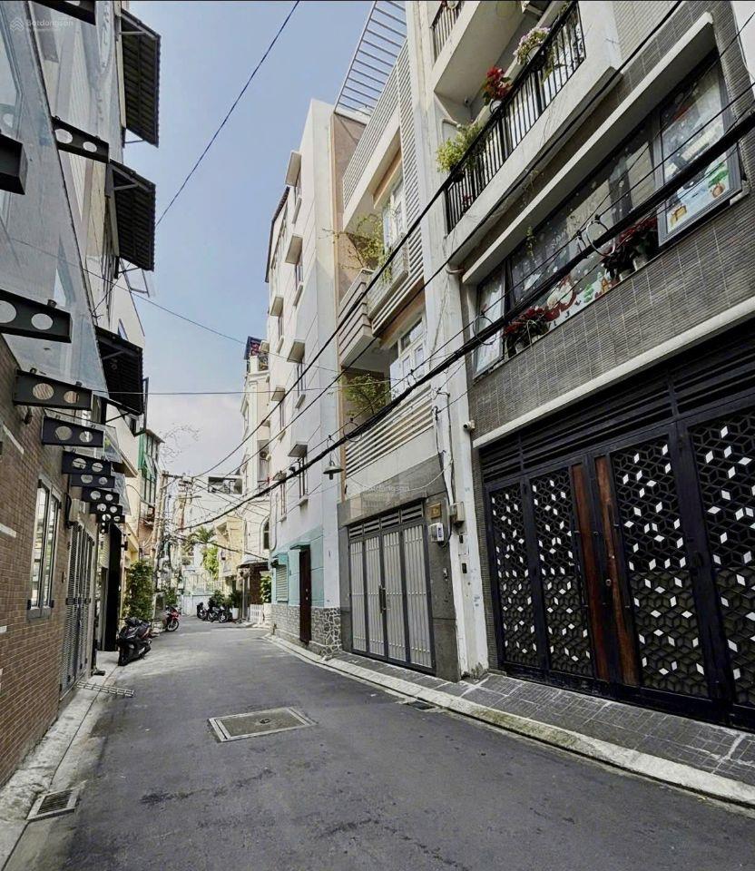 BÁN NHÀ 5 TẦNG,HXH, HUỲNH VĂN BÁNH, P11, PHÚ NHUẬN.DT:4X11, GIÁ;12,5 TỶ