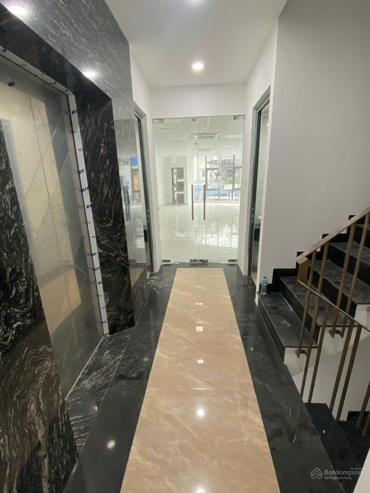Bán căn nhà mặt tiền đường ngay khu cx bắc hải diện tích 5x15 hầm 7 lầu thang máy giá 28 tỷ