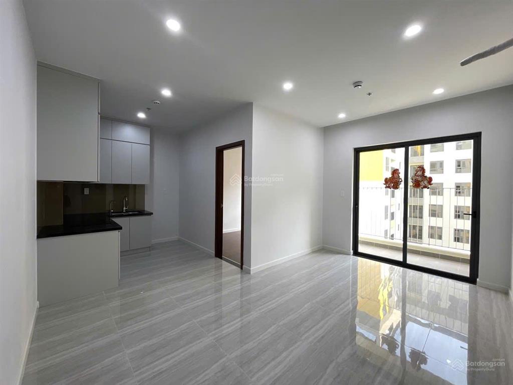 Nhà mới bcons city tháp emerald 2pn  ban công tây nam view nội khu hồ bơi và công viên thoáng mát