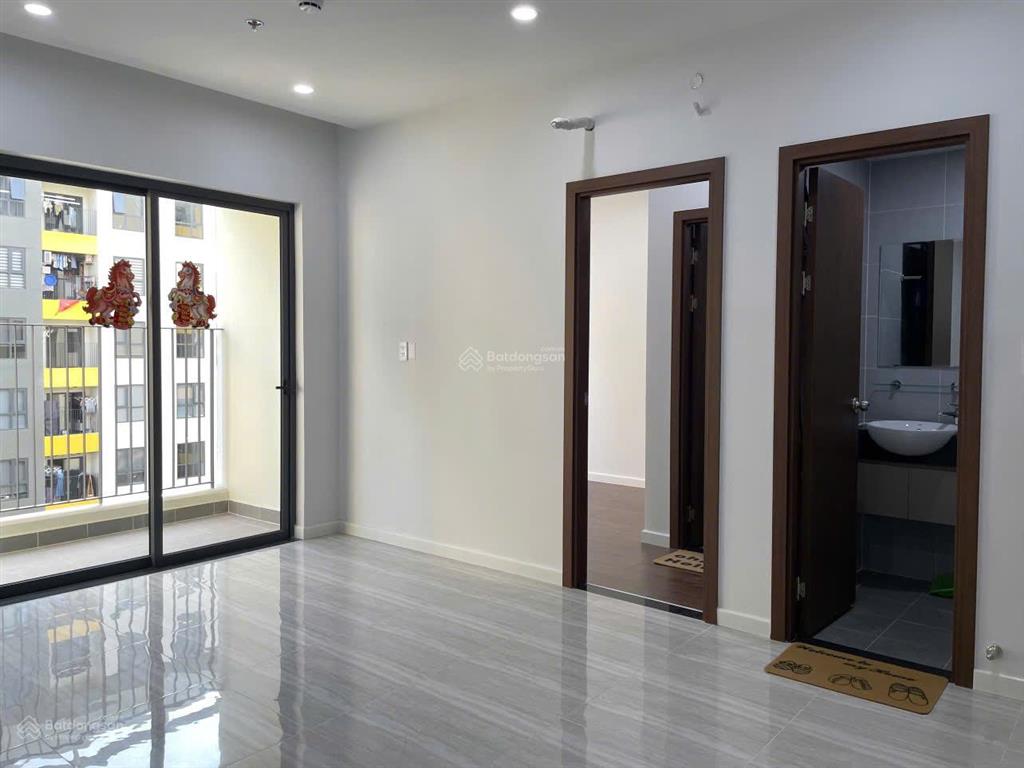 Nhà mới bcons city tháp emerald 2pn  ban công tây nam view nội khu hồ bơi và công viên thoáng mát