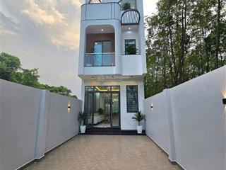 Nhà 2 lầu định hoà mặt tiền dx82 nhựa vỉa hè 12m thông gần bệnh viện 500 giường. 5x25