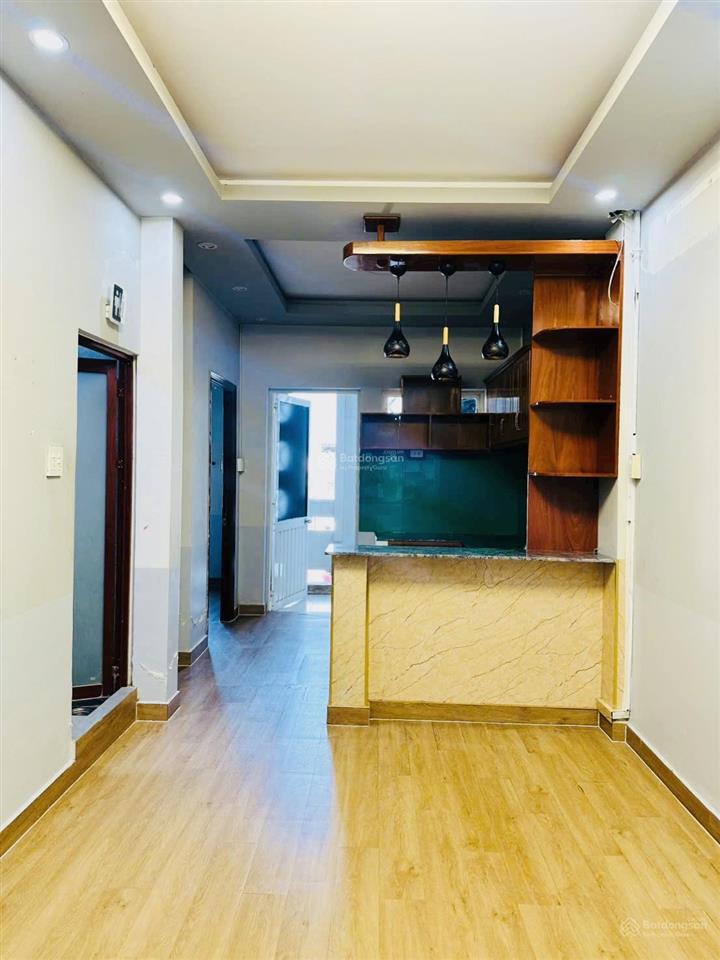 Cho thuê căn hộ hưng phú 48m2, 2 phòng ngủ, 1 máy lạnh, 2wc, đông nam, thang máy, sàn lót gỗ