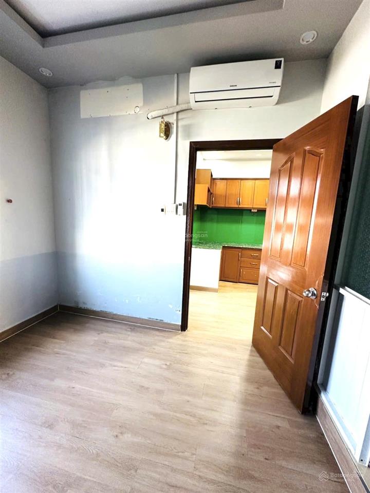 Cho thuê căn hộ hưng phú 48m2, 2 phòng ngủ, 1 máy lạnh, 2wc, đông nam, thang máy, sàn lót gỗ