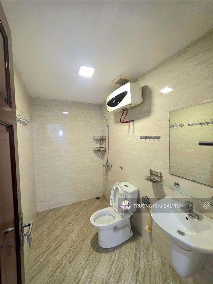 Sổ đỏ vĩnh viễn! chung cư e1 học viện âm nhạc  hào nam  ô chợ dừa  đống đa! gần ga tàu điện