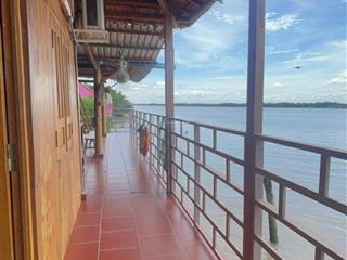 Nhà gỗ bên sông sát phà bình ninh 400m² thổ cư, sẵn kè kiên cố