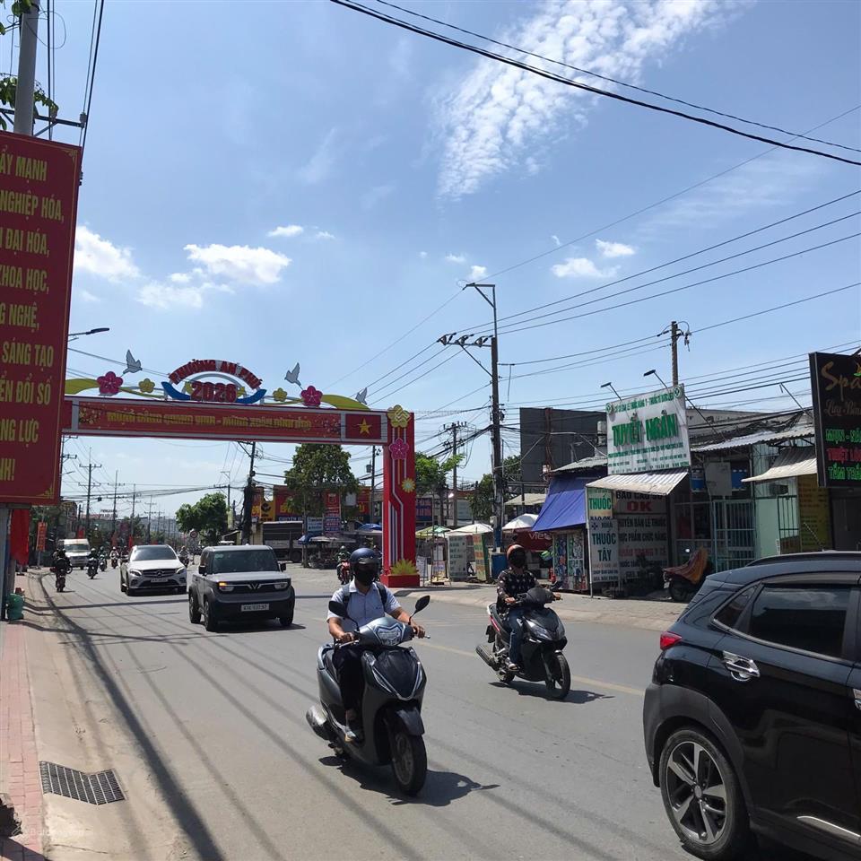 Bán toà nhà 4 lầu mặt tiền đường 22 tháng 12, phường an phú, thuận an, bình dương, ngang 10x71.25m