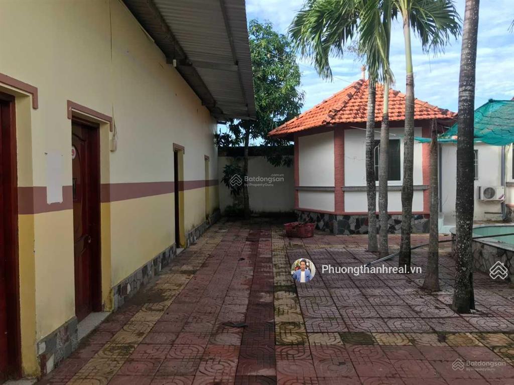 Bán nhà mt quốc lộ 57, gần bệnh viện đa khoa vĩnh long, 1500m2, 20 phòng cho thuê, 22 tỷ