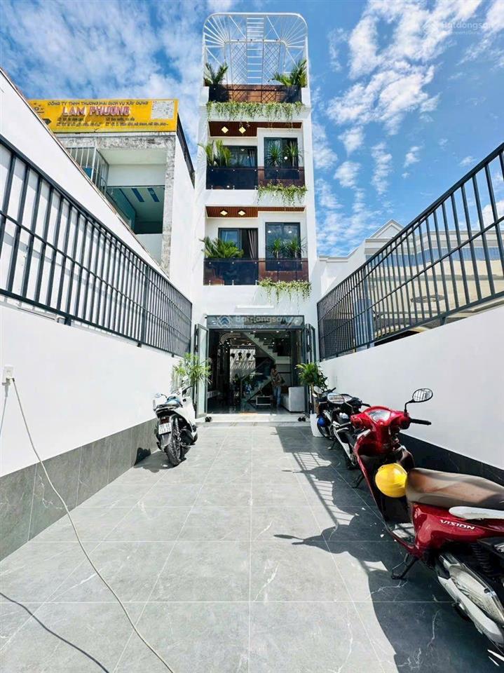 Bán nhà mặt tiền kinh doanh ngang 4m2 dài 20m. nhà trệt + lửng + 3 lầu mới 100%
