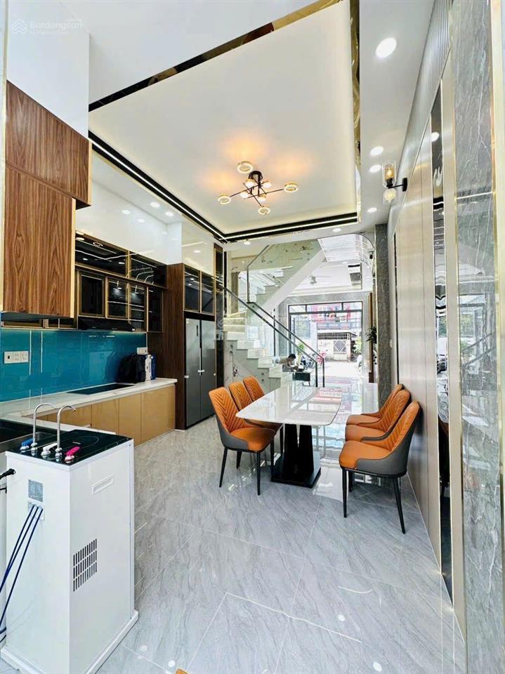 Bán nhà mặt tiền kinh doanh ngang 4m2 dài 20m. nhà trệt + lửng + 3 lầu mới 100%