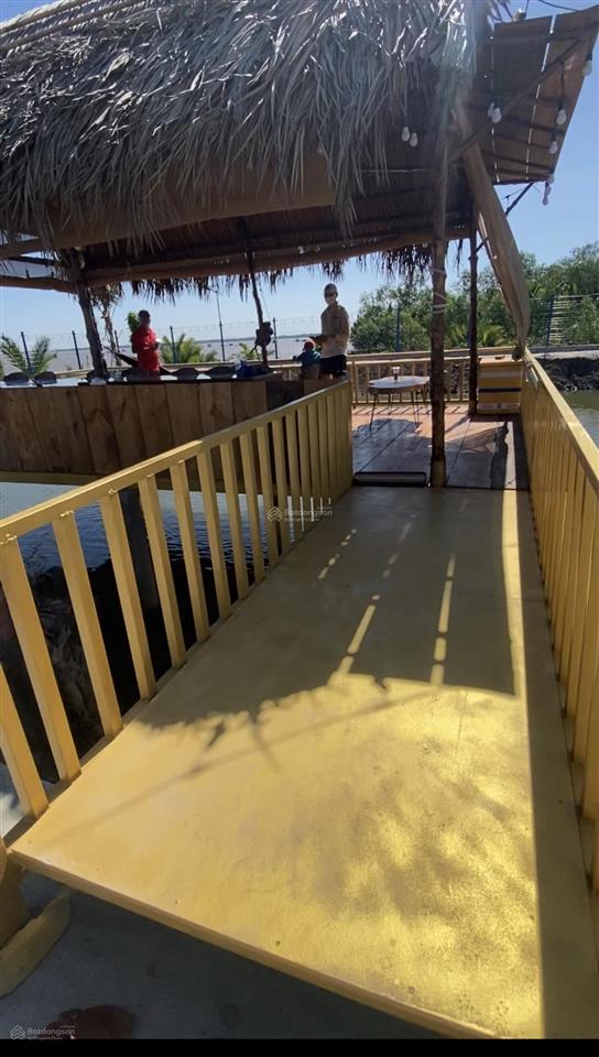 Cần bán căn nhà vườn 1300m2 mặt tiền đường ô tô với mặt tiền sông xoài rạp tại xã an thới đông