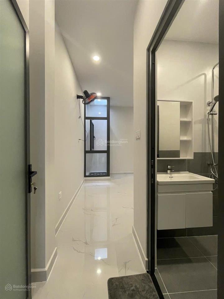 Hẻm nhựa xe hơi thông phường 14 tân bình. 60m2 1 trệt 2 lầu