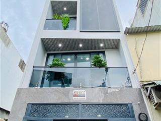 Siêu phẩm 5 tầng thang máy  2 mặt hẻm xe hơi  xây mới 100%  gồm 4pn + 2 sân thượng trước sau