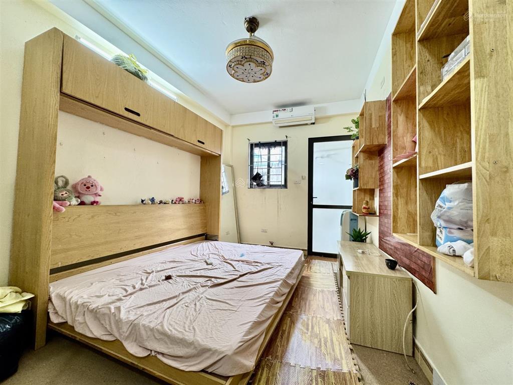 Nhà phố xã đàn 35m2, gara ô tô ngõ thông kinh doanh  5 tầng, khung cột 2 mặt ngõ