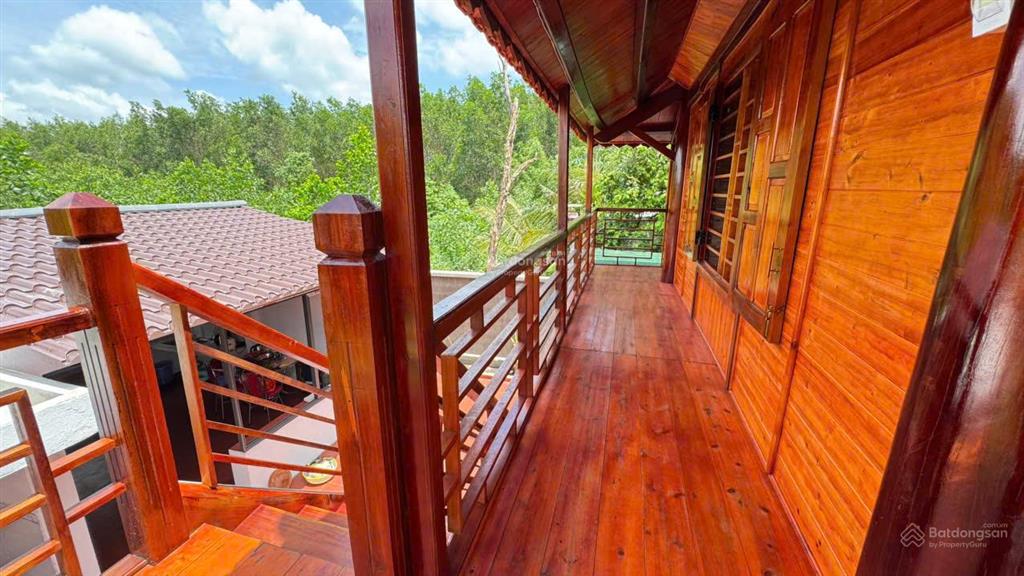 Bán căn nhà gỗ 1 lầu 1 triệt gần biển lộc an  hồ tràm