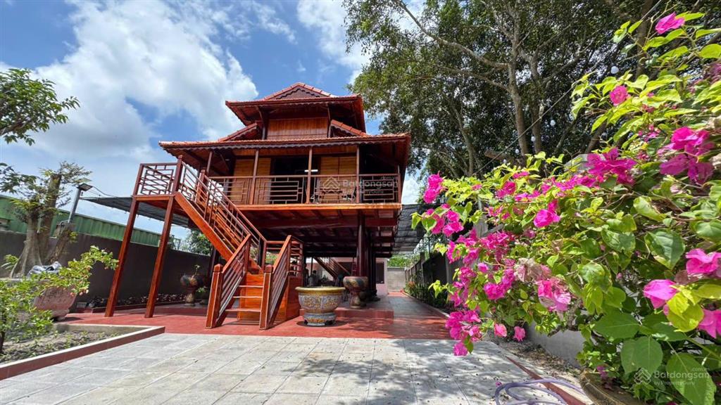 Bán căn nhà gỗ 1 lầu 1 triệt gần biển lộc an  hồ tràm