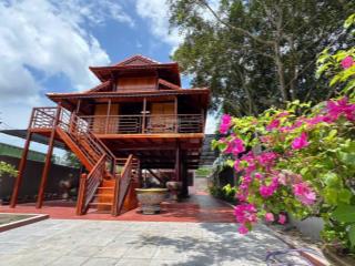 Bán căn nhà gỗ 1 lầu 1 triệt gần biển lộc an  hồ tràm