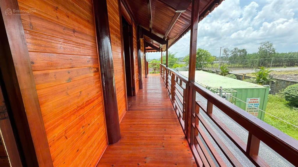 Bán căn nhà gỗ 1 lầu 1 triệt gần biển lộc an  hồ tràm