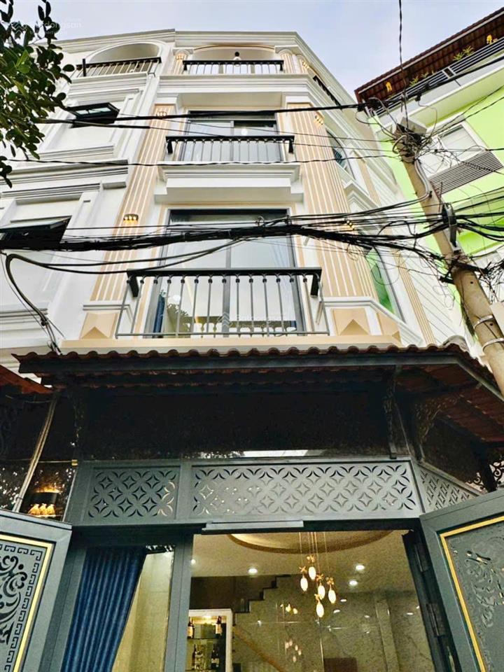 Cần bán nhà 4 tầng mới xây  nội thất cao cấp hẻm 6m lê quang định  trong khu toàn nhà biệt thự