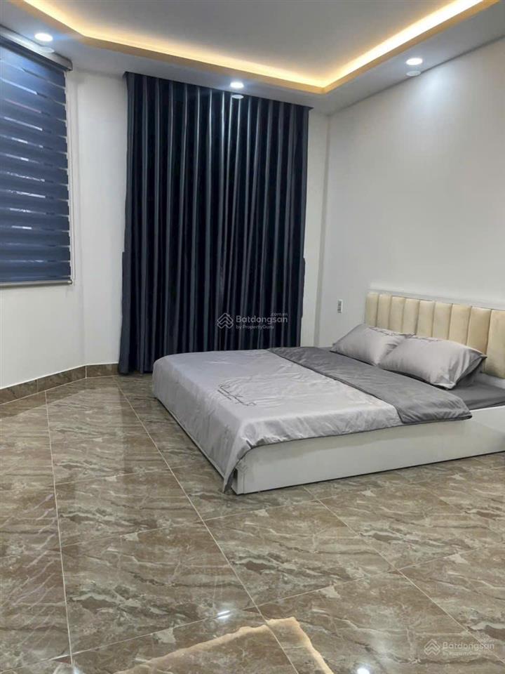 Cần bán nhà 4 tầng mới xây  nội thất cao cấp hẻm 6m lê quang định  trong khu toàn nhà biệt thự
